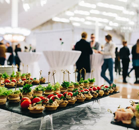 Tamleigh Catering staff serving guests at a corporate event